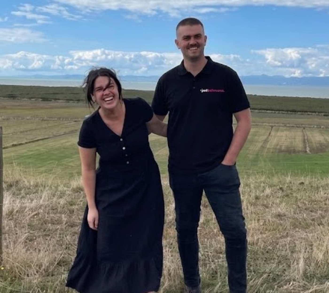 Louis and Steph standing in a Waikato paddock